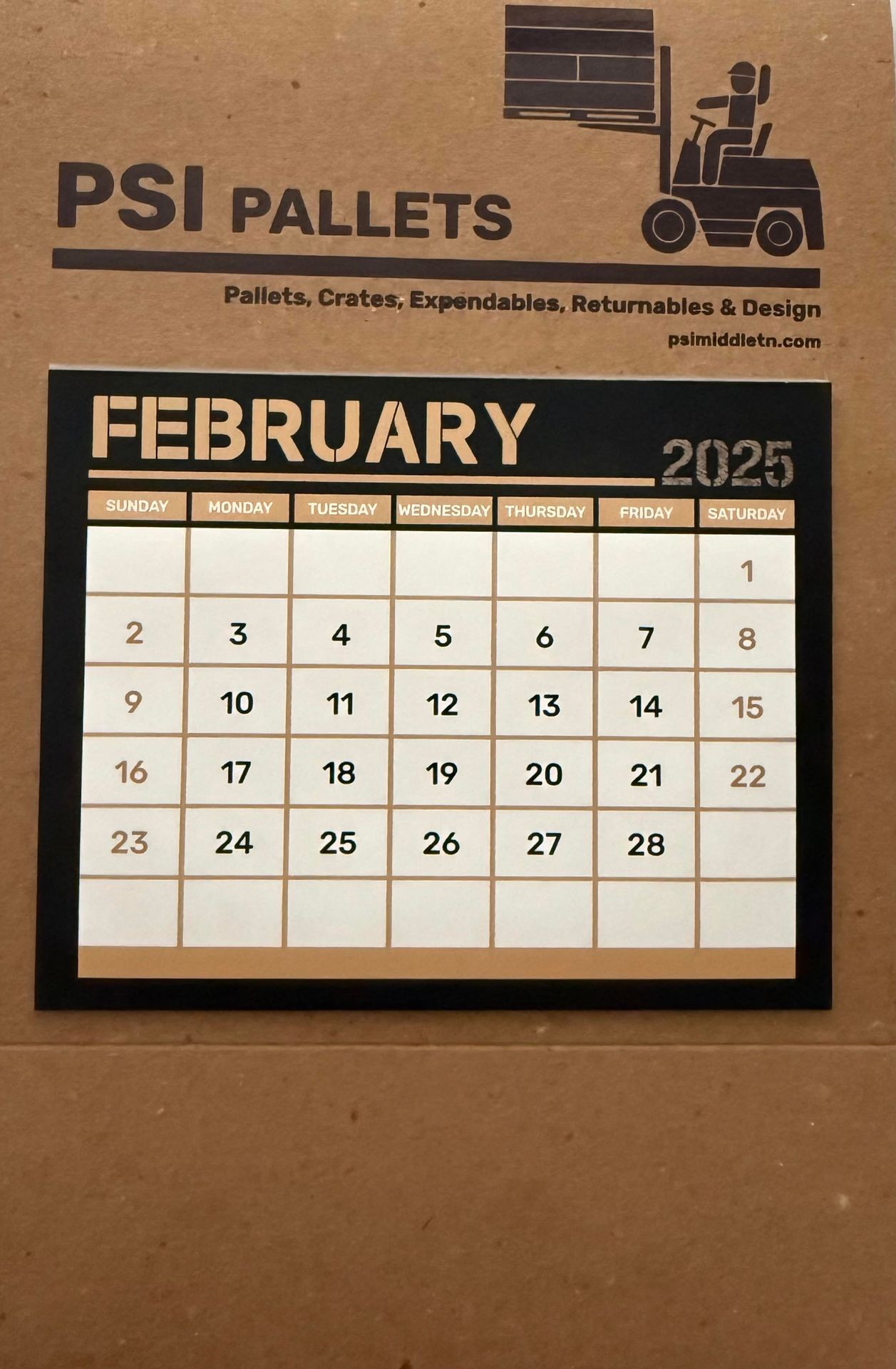 February 2025 calendar on a PSI Pallets background with forklift graphic.